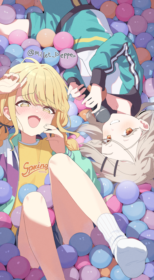 millet pepper, fujita kotone, shinosawa hiro, gakuen idolmaster, idolmaster, 2girls, ball pit, bare legs, blonde hair, blush, braid, colored eyelashes, fang, hair spread out, holding, holding microphone, legs up, looking at viewer, lying, microphone, multiple girls, nervous smile, no shoes, nose blush, on back, on side, orange eyes, skin fang, smile, socks, twin braids, twitter username, white socks, yellow eyes