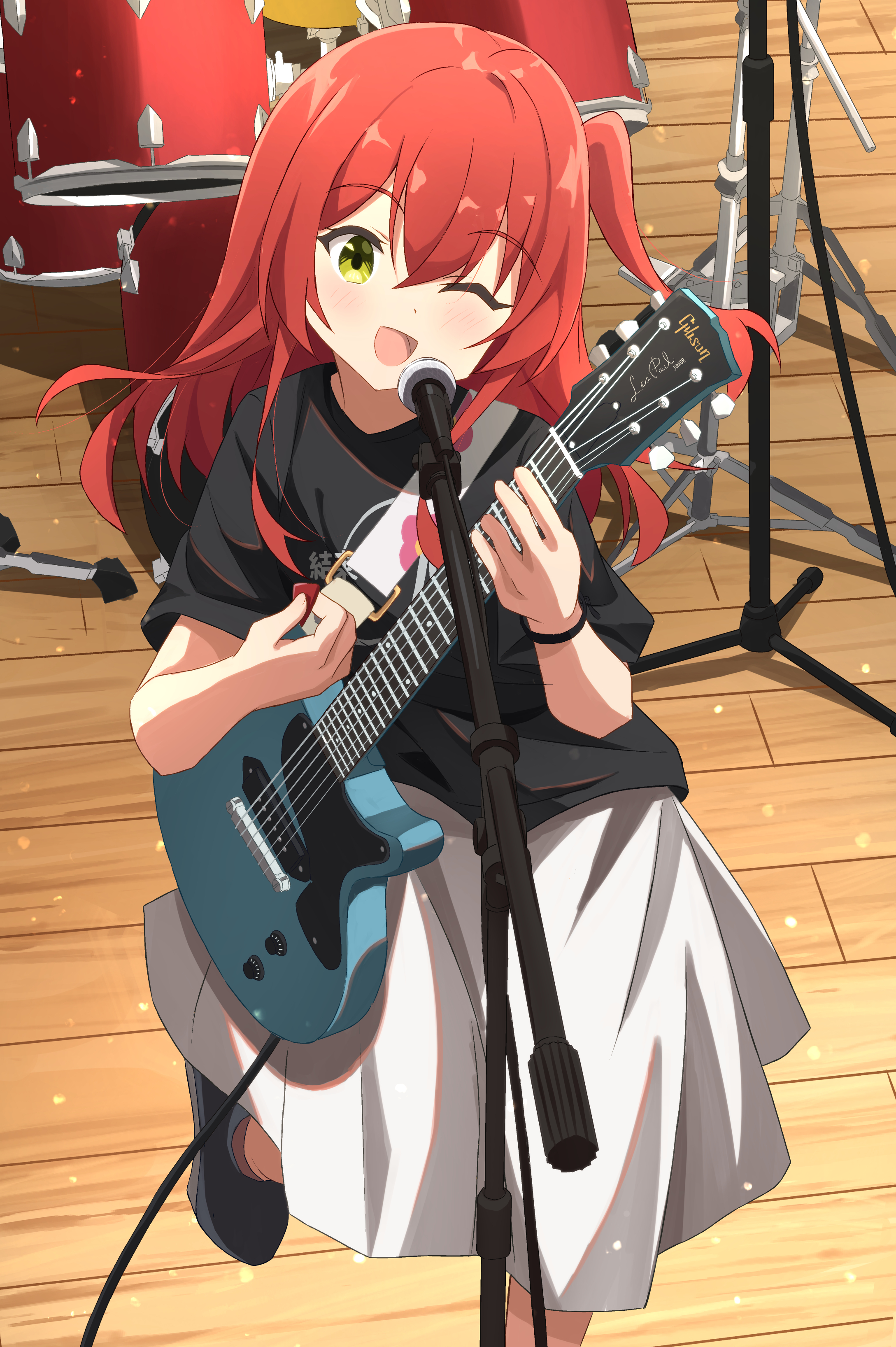chinosuke (cs4126), kita ikuyo, bocchi the rock!, absurdres, commentary request, highres, 1girl, :d, black shirt, black shoes, blush, breasts, cable, double-parted bangs, drum, electric guitar, gibson les paul, green eyes, grey skirt, guitar, guitar strap, holding, holding guitar, holding instrument, holding plectrum, instrument, leg up, long skirt, looking at viewer, medium hair, microphone, microphone stand, music, one eye closed, one side up, open mouth, playing instrument, plectrum, red hair, shirt, shoes, skirt, small breasts, smile, solo, standing, wooden floor, wristband
