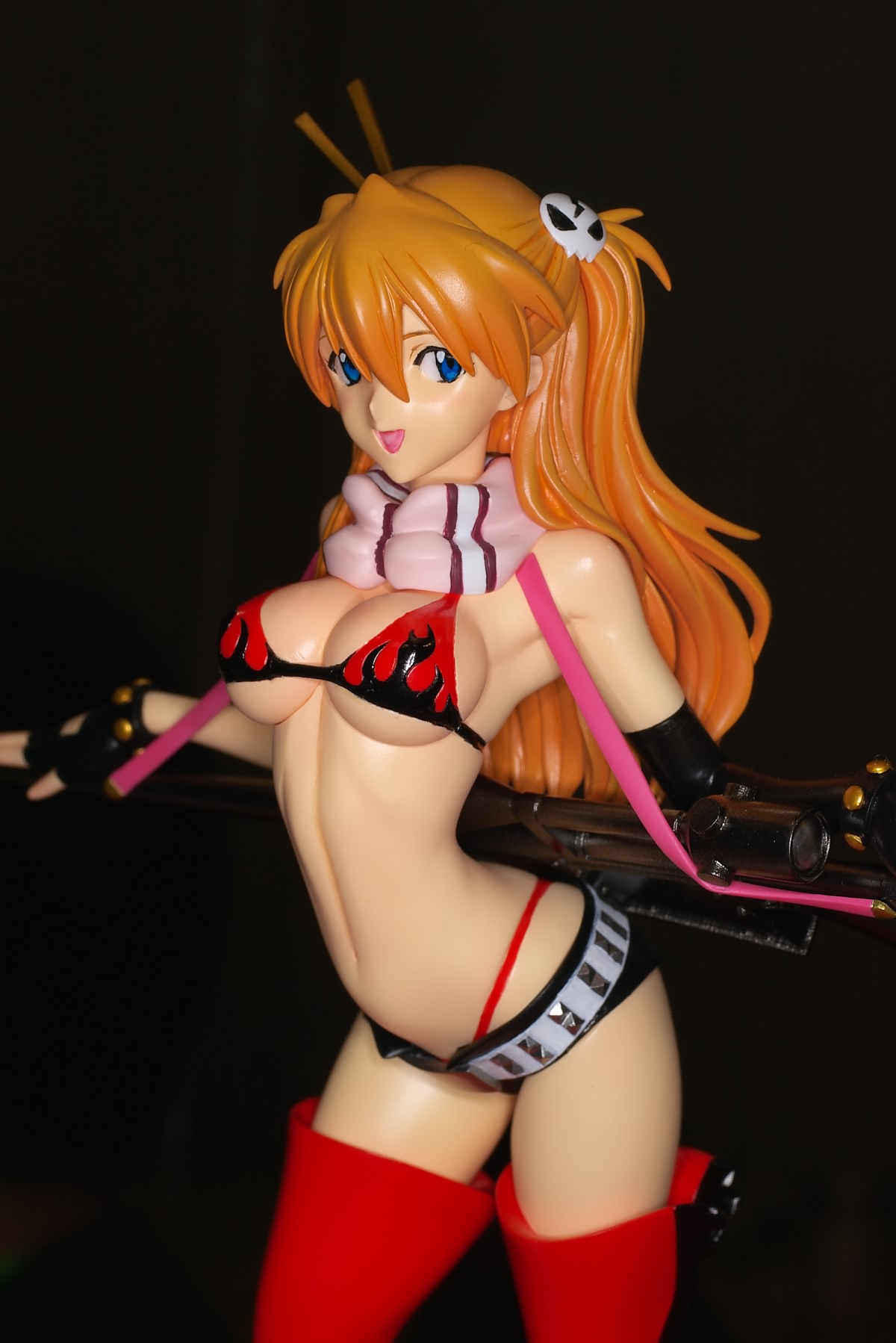 souryuu asuka langley, yoko littner, neon genesis evangelion, tengen toppa gurren lagann, wonder festival, wonder festival 2008, highres, photo (medium), 1girl, arched back, belt, bikini, bikini top only, blue eyes, boots, breasts, chopsticks, cleavage, cosplay, female focus, figure, figure (medium), gun, hair ornament, long hair, midriff, orange hair, panties, red hair, red panties, red thighhighs, rifle, scarf, short shorts, shorts, skull, skull hair ornament, solo, studded belt, swimsuit, thigh boots, thighhighs, thong, underboob, underwear, weapon, whale tail (clothing), yoko littner (cosplay)
