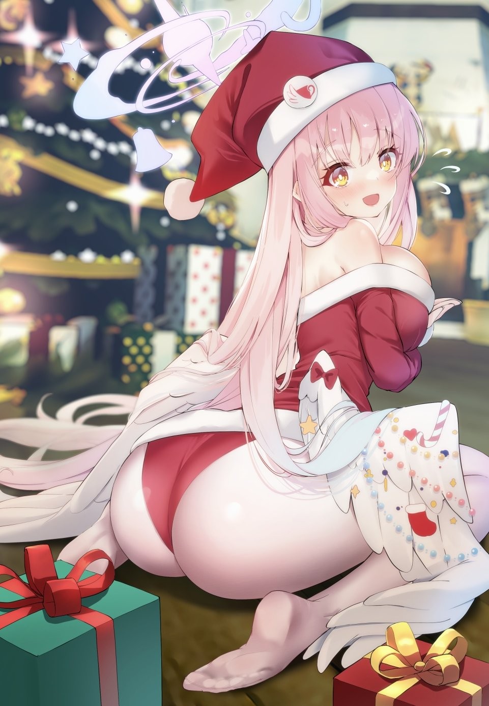 hato haru, mika (blue archive), blue archive, highres, 1girl, alternate costume, angel wings, arms under breasts, ass, bare shoulders, breasts, christmas, christmas present, christmas tree, dress, feathered wings, gift, hair spread out, halo, hat, large breasts, long hair, looking at viewer, low wings, no shoes, off-shoulder dress, off shoulder, pantyhose, pink hair, red dress, santa hat, sitting, solo, very long hair, wariza, white pantyhose, white wings, wings, yellow eyes