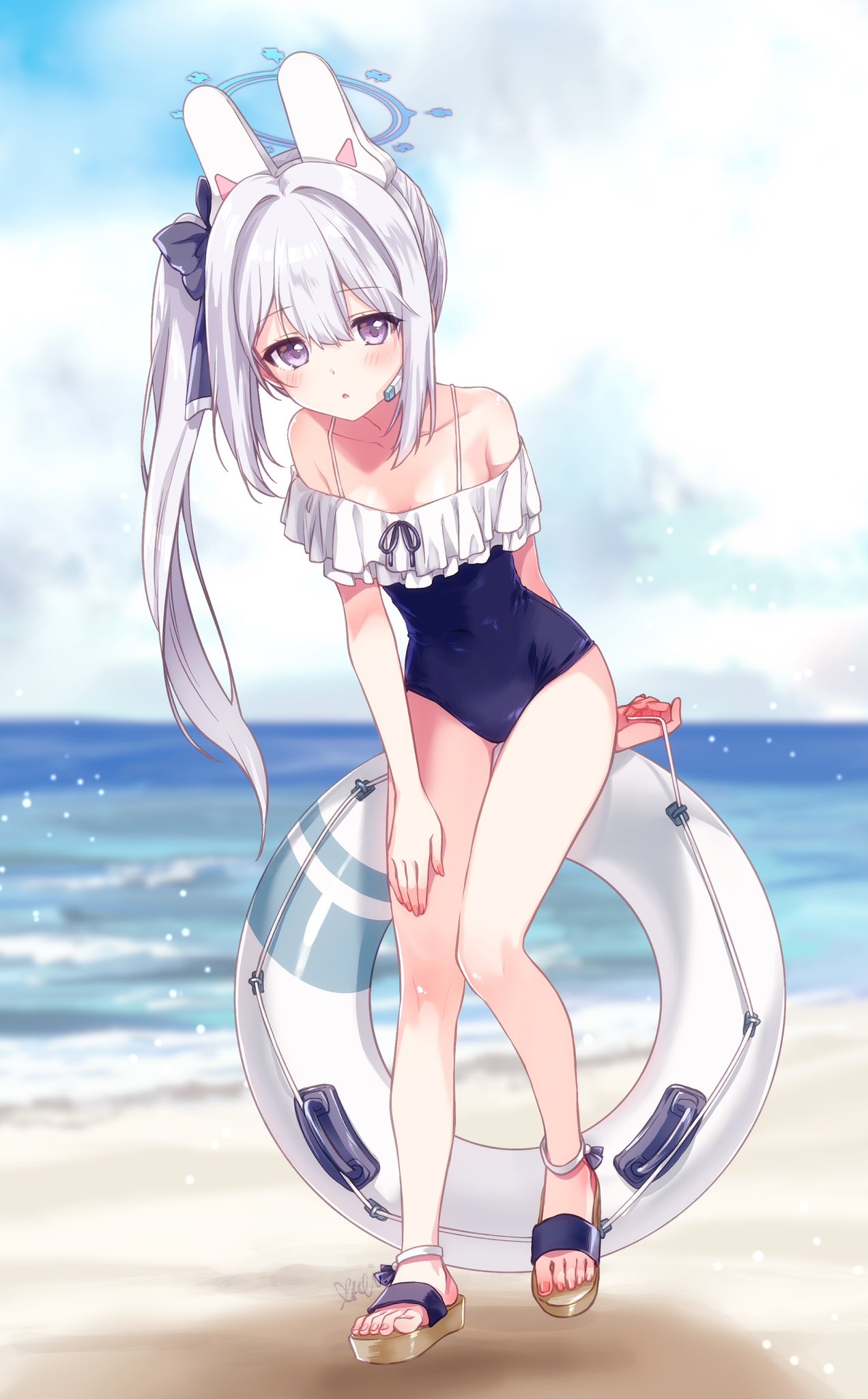 kuroi mimei, miyako (blue archive), miyako (swimsuit) (blue archive), blue archive, commentary request, highres, 1girl, animal ears, bare legs, bare shoulders, beach, black bow, blue halo, blue one-piece swimsuit, blush, bow, collarbone, day, fake animal ears, frilled one-piece swimsuit, frills, full body, hair bow, hair intakes, halo, holding, holding swim ring, innertube, leaning forward, long hair, looking at viewer, ocean, off-shoulder one-piece swimsuit, off shoulder, official alternate costume, official alternate hairstyle, one-piece swimsuit, outdoors, purple eyes, rabbit ears, sandals, sidelocks, solo, straight-on, straight hair, swim ring, swimsuit, thigh gap, toes, very long hair