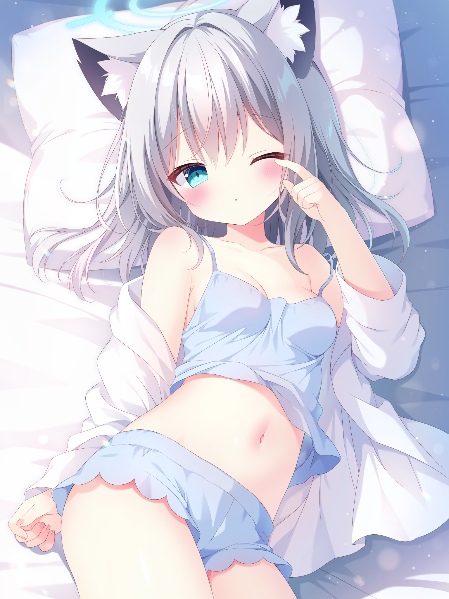 shiroko (blue archive), blue archive, commentary request, highres, 1girl, animal ear fluff, animal ears, bare shoulders, blue halo, blue shorts, blush, breasts, collarbone, cowboy shot, green eyes, grey hair, halo, hand up, long sleeves, looking at viewer, loungewear, lying, medium hair, navel, nekoboshi yuki, off shoulder, on back, on bed, one eye closed, open clothes, open shirt, parted lips, pillow, shirt, short shorts, shorts, small breasts, solo, spaghetti strap, white shirt, wolf ears, wolf girl