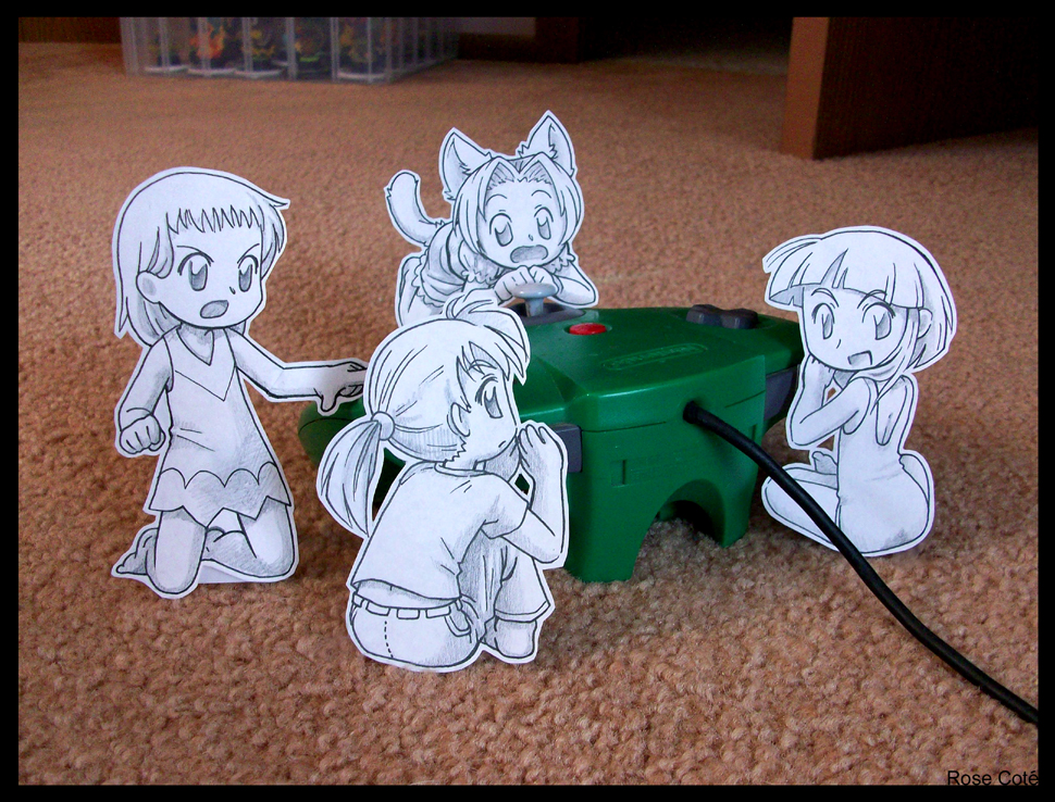 pimmy, papercraft (medium), photo (medium), unconventional media, 4girls, animal ears, border, cable, cat ears, controller, game console, looking back, multiple girls, paper child, playing games, sitting, video game