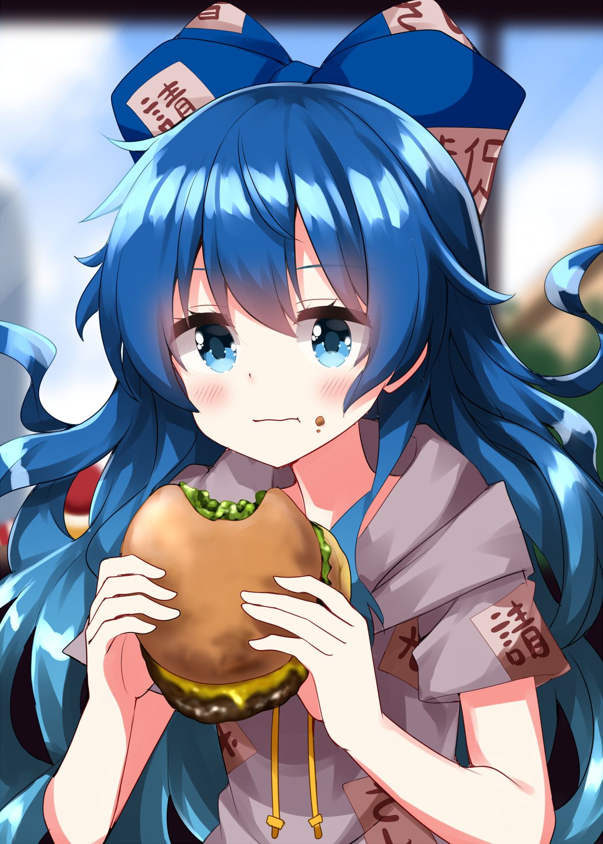 ruu (tksymkw), yorigami shion, touhou, commentary request, highres, 1girl, blue bow, blue eyes, blue hair, blurry, blurry background, blush, bow, burger, closed mouth, eating, eyes visible through hair, floating hair, food, food on face, grey hoodie, hair between eyes, hair bow, holding, holding food, hood, hood down, hoodie, long hair, looking at viewer, short sleeves, solo, upper body