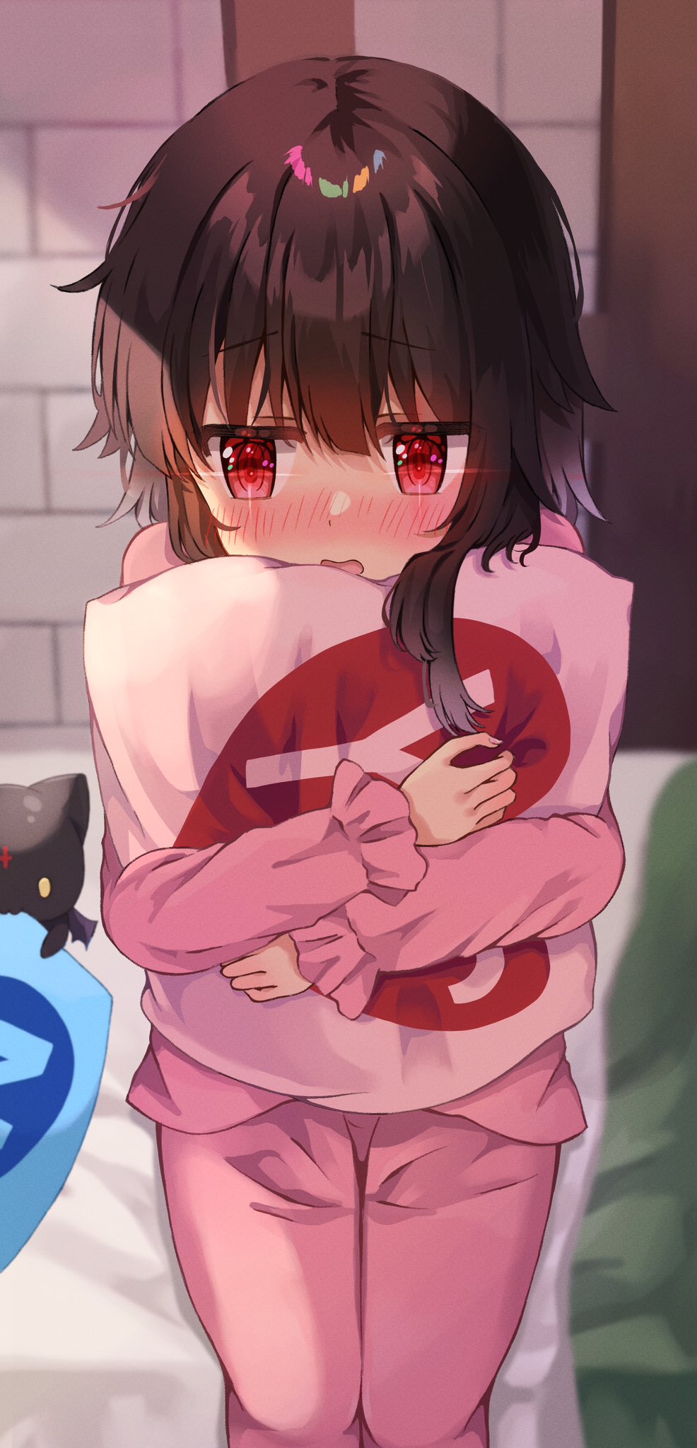 yuno (suke yuno), chomusuke, megumin, kono subarashii sekai ni shukufuku wo!, pink pillow, commentary, highres, 1girl, bedroom, black cat, blunt bangs, blush, brown hair, cat, cowboy shot, embarrassed, eyes visible through hair, frilled sleeves, frills, hair between eyes, holding, holding pillow, hugging object, indoors, long sleeves, looking to the side, no, no headwear, nose blush, on bed, open mouth, pajamas, pillow, pillow hug, pink pajamas, pout, raised eyebrows, red eyes, short hair with long locks, sitting, solo, sparkling eyes, straight-on, wavy mouth, yes, yes-no pillow