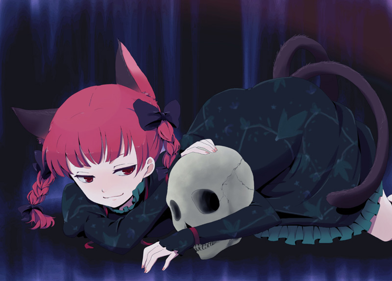ica, kaenbyou rin, touhou, 1girl, animal ears, blunt bangs, blush, braid, cat ears, cat girl, dress, female focus, green dress, long sleeves, looking at viewer, lying, on stomach, skull, solo, twin braids