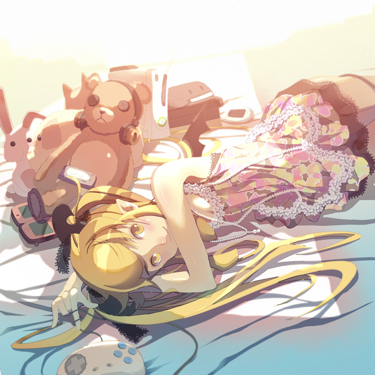 vofan, original, highres, 1girl, blonde hair, controller, dress, female focus, game console, game controller, gamepad, handheld game console, headphones, long hair, lying, nintendo ds, rabbit, solo, stuffed animal, stuffed toy, teddy bear, twintails, xbox 360, yellow eyes