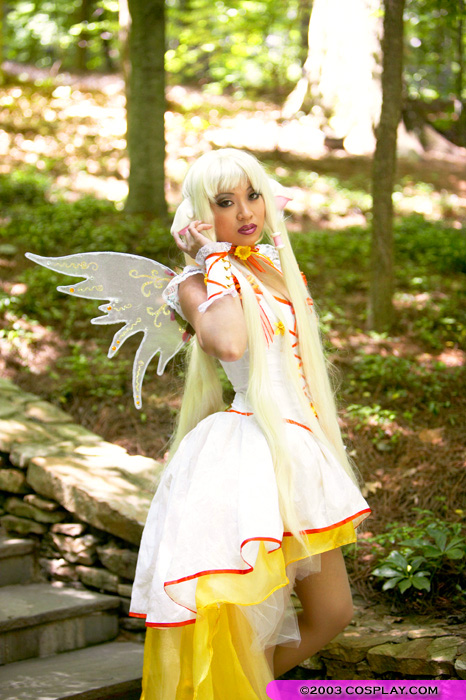 clamp, yaya han, chii, chobits, photo (medium), angelicstar, blonde hair, bow, cosplay, dress, lipstick, long dress, long hair, makeup, photo shoot, red lips, short twintails, twintails, wings, yellow dress