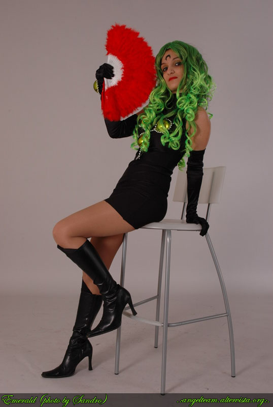 esmeraude (sailor moon), bishoujo senshi sailor moon, bishoujo senshi sailor moon r, photo (medium), 1girl, boots, cosplay, curly hair, esmeraude (sailor moon) (cosplay), feathers, female focus, green hair, hand fan, long hair, solo