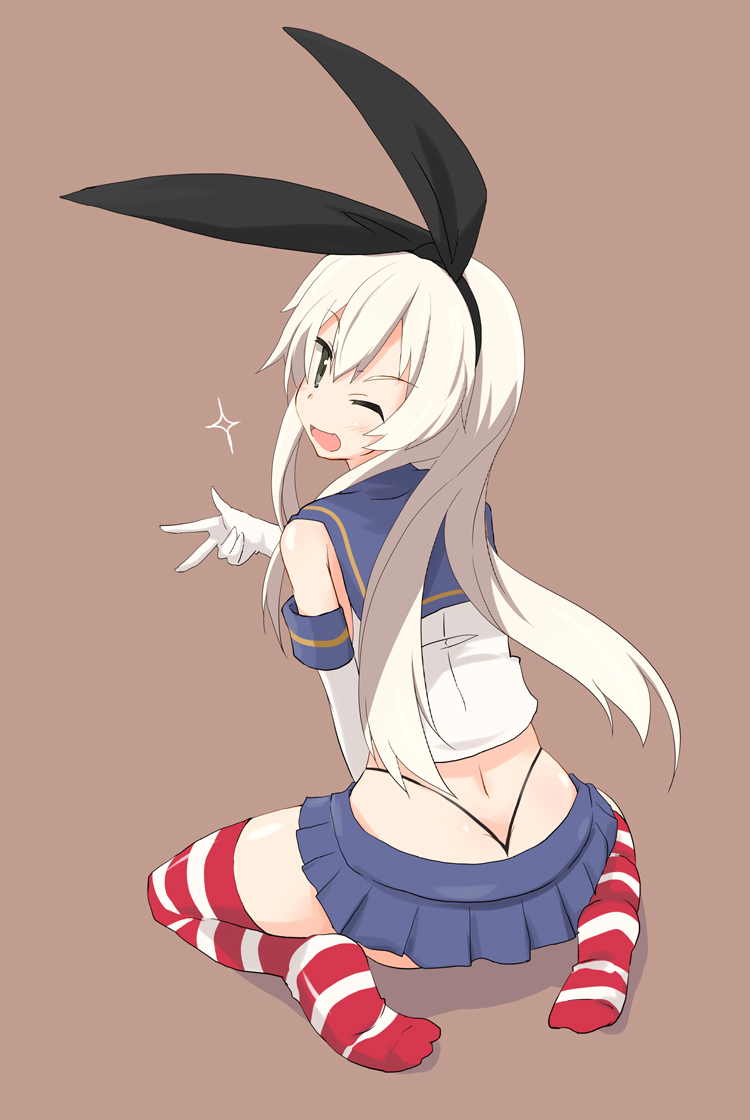 kugui kiyunemu, shimakaze (kancolle), kantai collection, commentary request, 1girl, :d, animal ear hairband, animal ears, black hairband, black panties, blonde hair, blue sailor collar, blue skirt, blush, brown background, crop top, cropped shirt, double-parted bangs, elbow gloves, fake animal ears, from above, from behind, full body, gloves, green eyes, hair between eyes, hairband, highleg, highleg panties, long hair, long sidelocks, looking at viewer, microskirt, one eye closed, open mouth, panties, pleated skirt, rabbit ear hairband, rabbit ears, red thighhighs, sailor collar, shadow, shirt, sidelocks, simple background, sitting, skirt, sleeveless, sleeveless shirt, smile, solo, sparkle, striped clothes, striped thighhighs, thighhighs, turning head, underwear, w, white gloves, white shirt