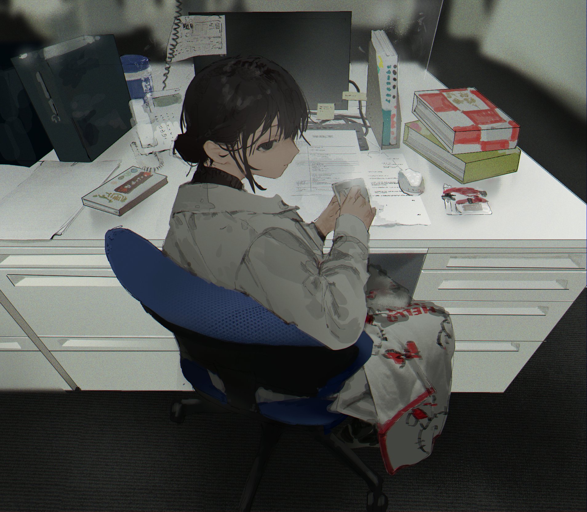 nemiya, hello kitty, original, sanrio, commentary, highres, 1girl, black eyes, black hair, book, chair, computer mouse, corded phone, covering with blanket, desk, from above, from behind, hair bun, looking at viewer, looking back, monitor, office, office chair, paper, phone, short hair, solo, sticky note, swivel chair