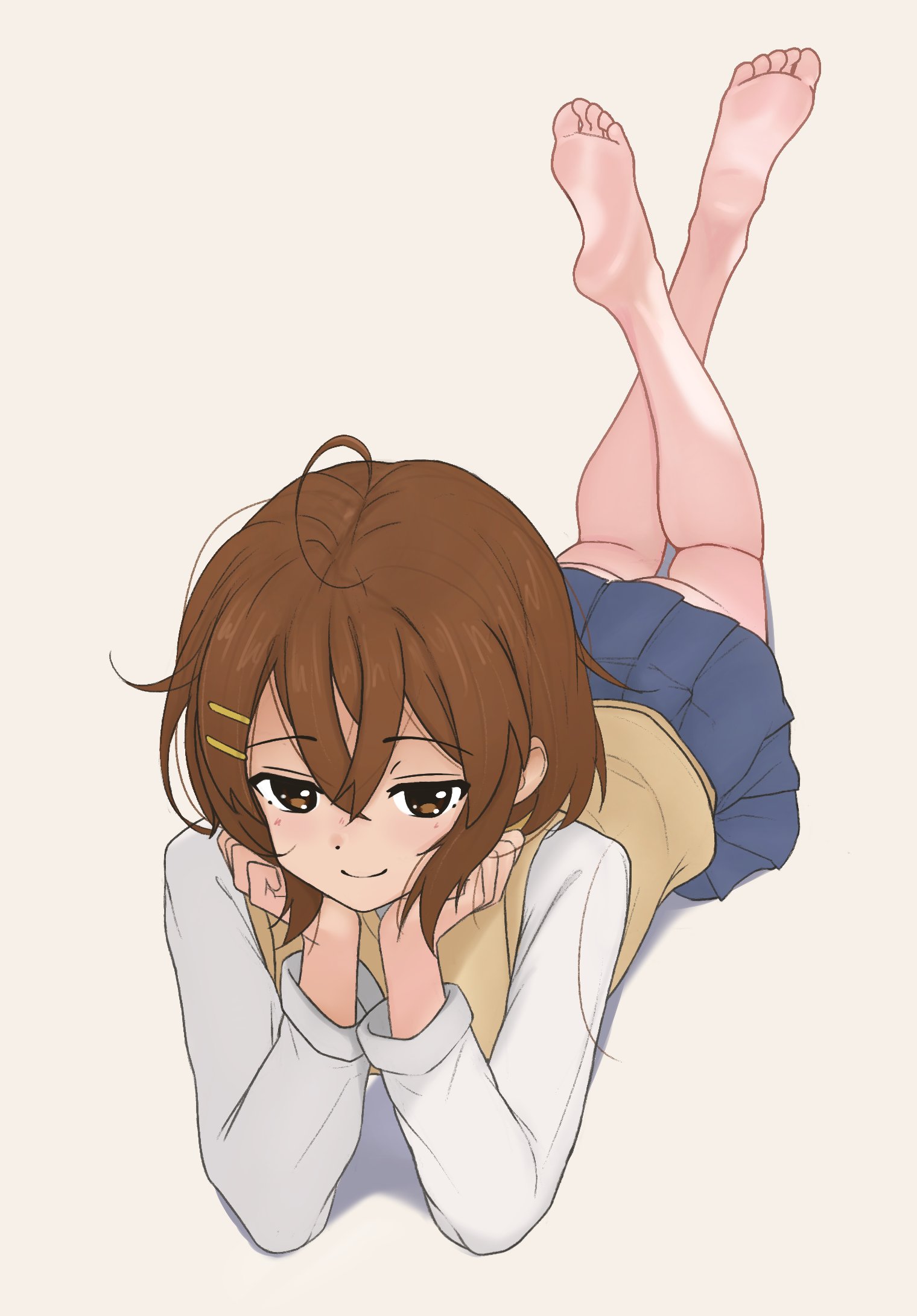 andreypavlow, hirasawa yui, k-on!, highres, 1girl, ahoge, bare legs, barefoot, blue skirt, blush, brown eyes, brown hair, closed mouth, crossed ankles, crossed bangs, feet, feet up, full body, grey background, hair between eyes, hair ornament, hairclip, long sleeves, looking at viewer, lying, medium hair, miniskirt, on stomach, sakuragaoka high school uniform, school uniform, shadow, simple background, skirt, smile, soles, solo, the pose, toes