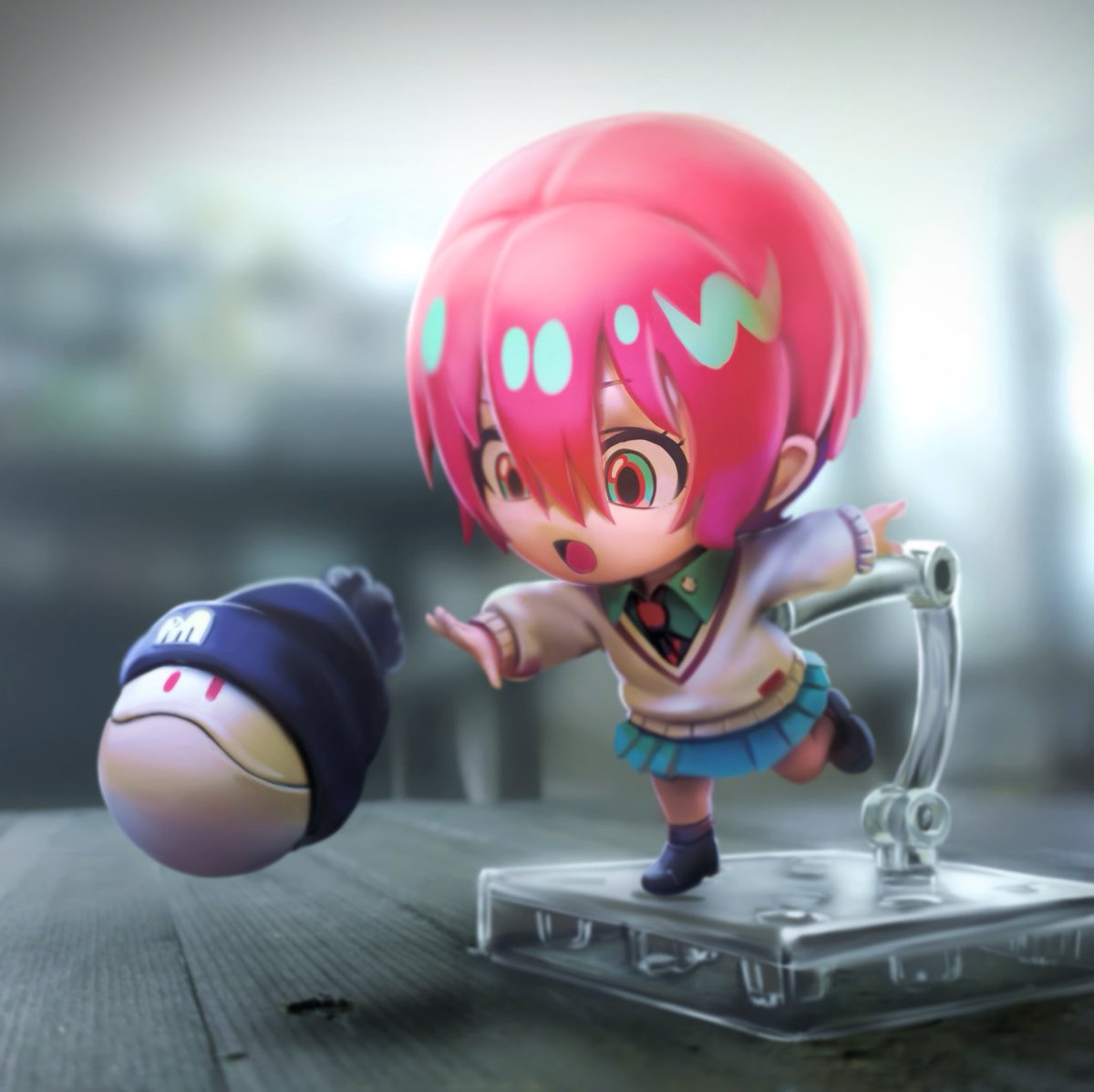 nekoita, amate yuzuriha, haro, gundam, gundam gquuuuuux, nendoroid, commentary, painttool sai (medium), 1girl, :o, aqua eyes, aqua shirt, beanie, black boots, blue skirt, blurry, blurry background, boots, chibi, chibi only, collared shirt, figure, hair between eyes, hat, looking at another, multicolored eyes, necktie, open mouth, outstretched arm, pleated skirt, pom pom (clothes), pom pom beanie, reaching, realistic, red eyes, red hair, red necktie, school uniform, shirt, short hair, skirt, sweater, two-tone eyes, white sweater