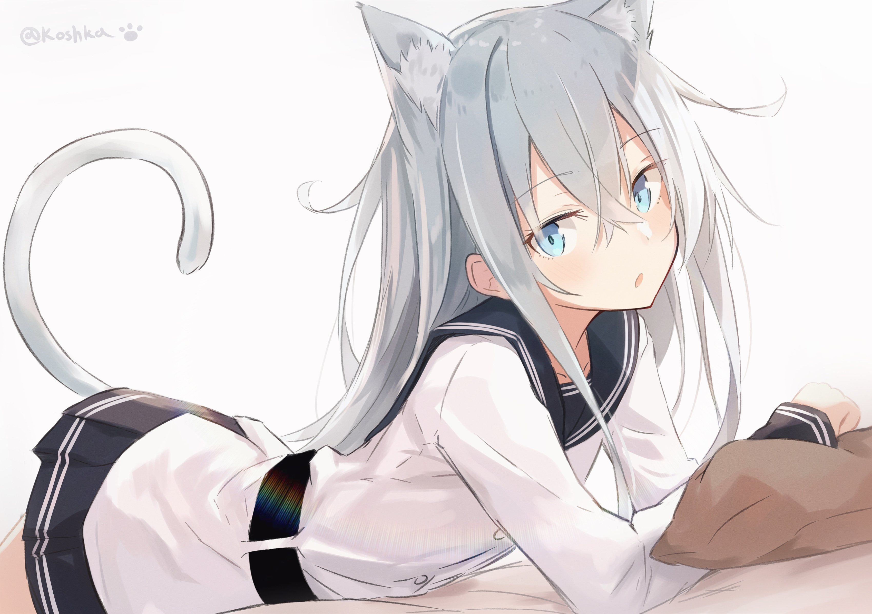 koshka pic, hibiki (kancolle), verniy (kancolle), kantai collection, absurdres, highres, 1girl, animal ears, black sailor collar, black skirt, blue eyes, cat ears, cat tail, cowboy shot, dress, extra ears, grey hair, lying, on stomach, pillow, pleated dress, sailor collar, sailor shirt, school uniform, serafuku, shirt, simple background, skirt, solo, tail, white background, white shirt