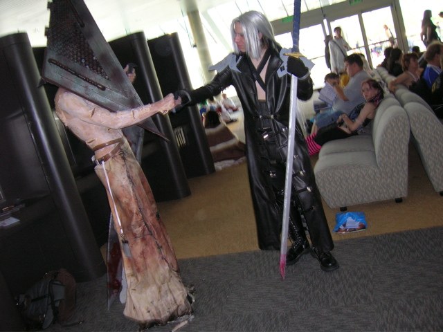 pyramid head, sephiroth, final fantasy, final fantasy vii, silent hill, silent hill (movie), silent hill (series), photo (medium), blood, cosplay, male focus, pyramid head (cosplay), sephiroth (cosplay), sword, weapon