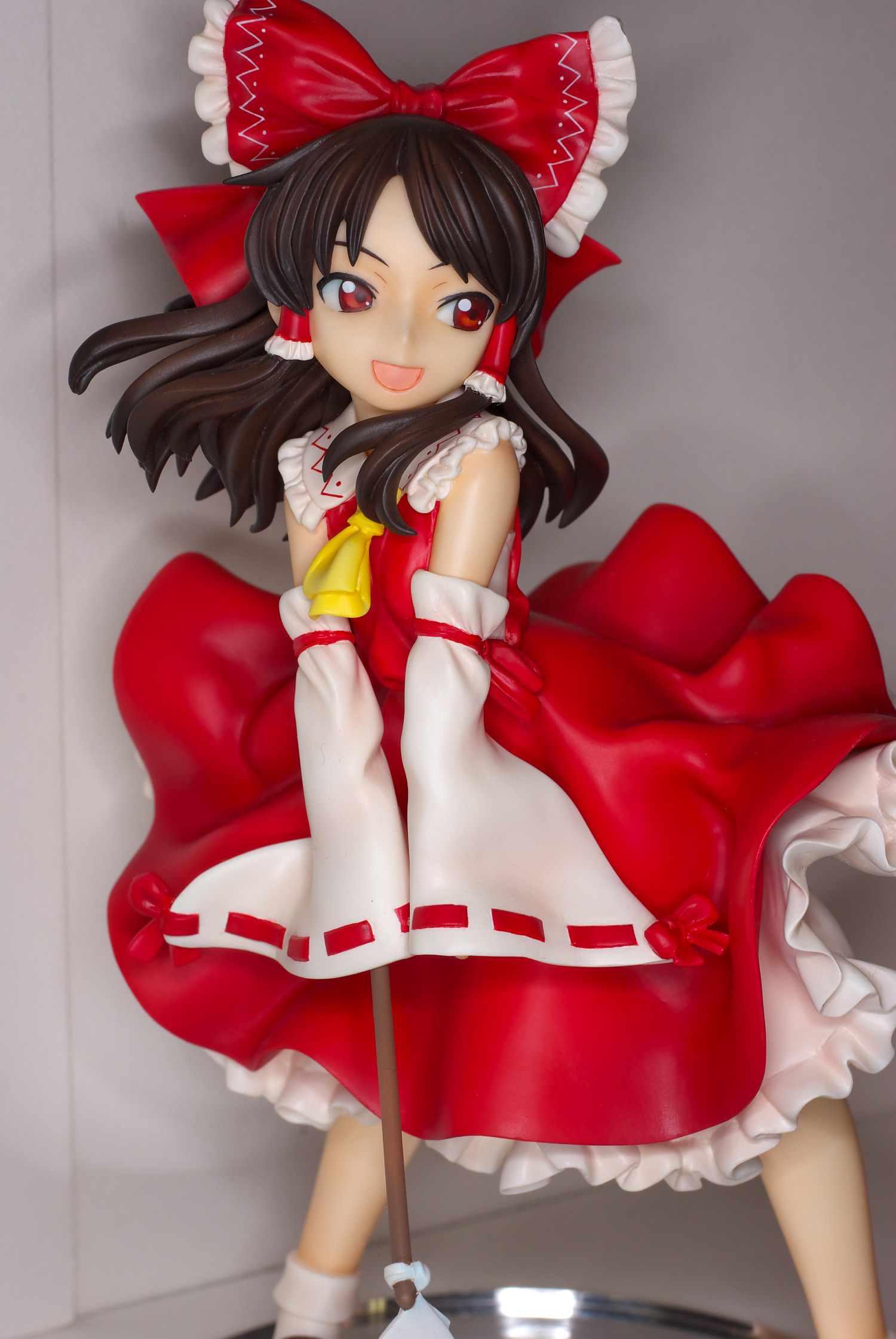 hakurei reimu, touhou, highres, photo (medium), brown hair, female focus, figure, japanese clothes, miko, red eyes, ribbon