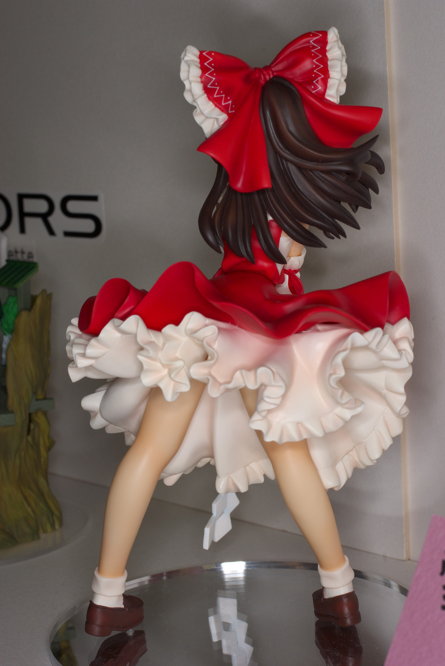hakurei reimu, touhou, highres, photo (medium), brown hair, female focus, figure, japanese clothes, miko, red eyes, ribbon