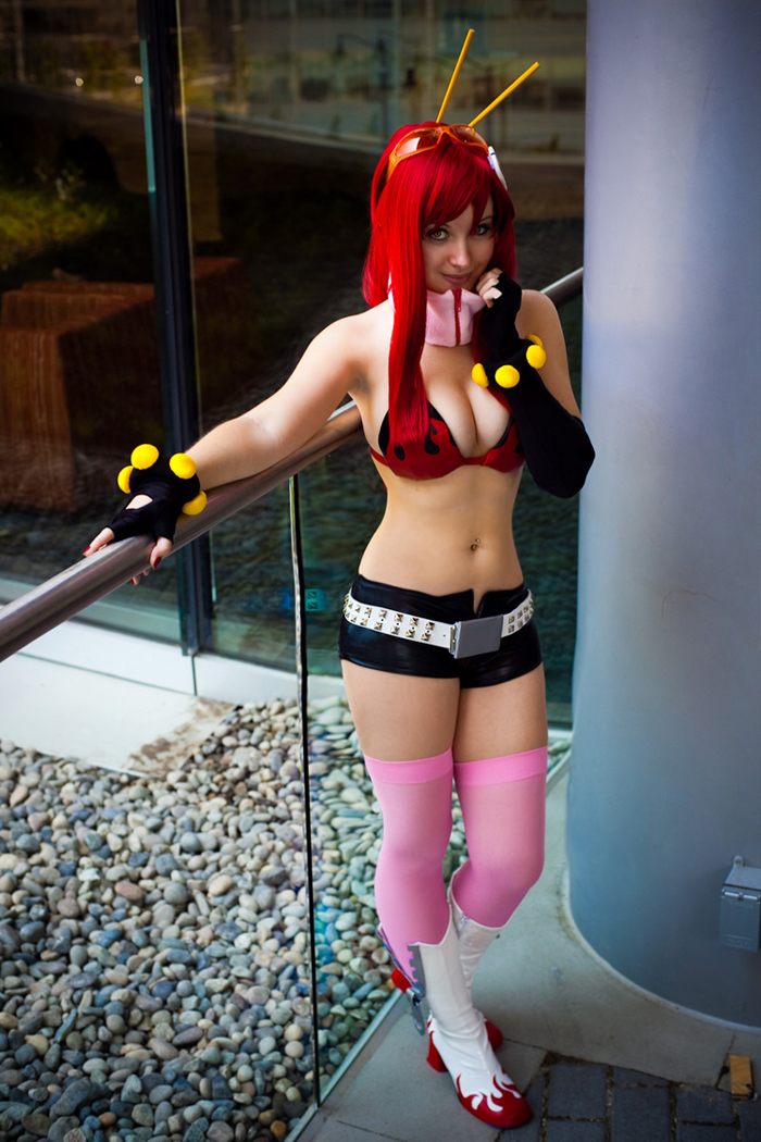 mortelle, yoko littner, tengen toppa gurren lagann, bad deviantart id, bad id, cosplay photo, photo (medium), third-party edit, 1girl, bare shoulders, belt, bikini, bikini top only, boots, breasts, cleavage, cosplay, elbow gloves, female focus, fingerless gloves, gloves, large breasts, midriff, navel, navel piercing, piercing, red hair, short shorts, shorts, smile, solo, studded belt, swimsuit, thighhighs, zipper