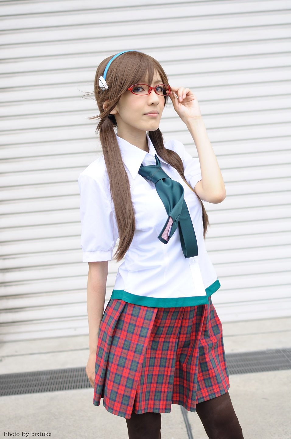 chamaro, makinami mari illustrious, evangelion: 2.0 you can (not) advance, neon genesis evangelion, rebuild of evangelion, cosplay photo, highres, photo (medium), 1girl, arms up, brown hair, cosplay, female focus, glasses, hairband, long hair, necktie, pantyhose, plaid clothes, plaid skirt, school uniform, skirt, solo, twintails
