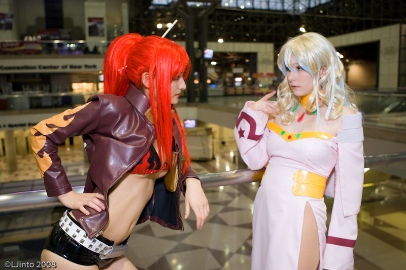 nia teppelin, yoko littner, tengen toppa gurren lagann, cosplay photo, photo (medium), bikini, bikini top only, blue eyes, breasts, cleavage, cosplay, large breasts, long hair, midriff, multicolored hair, ponytail, red hair, shorts, swimsuit