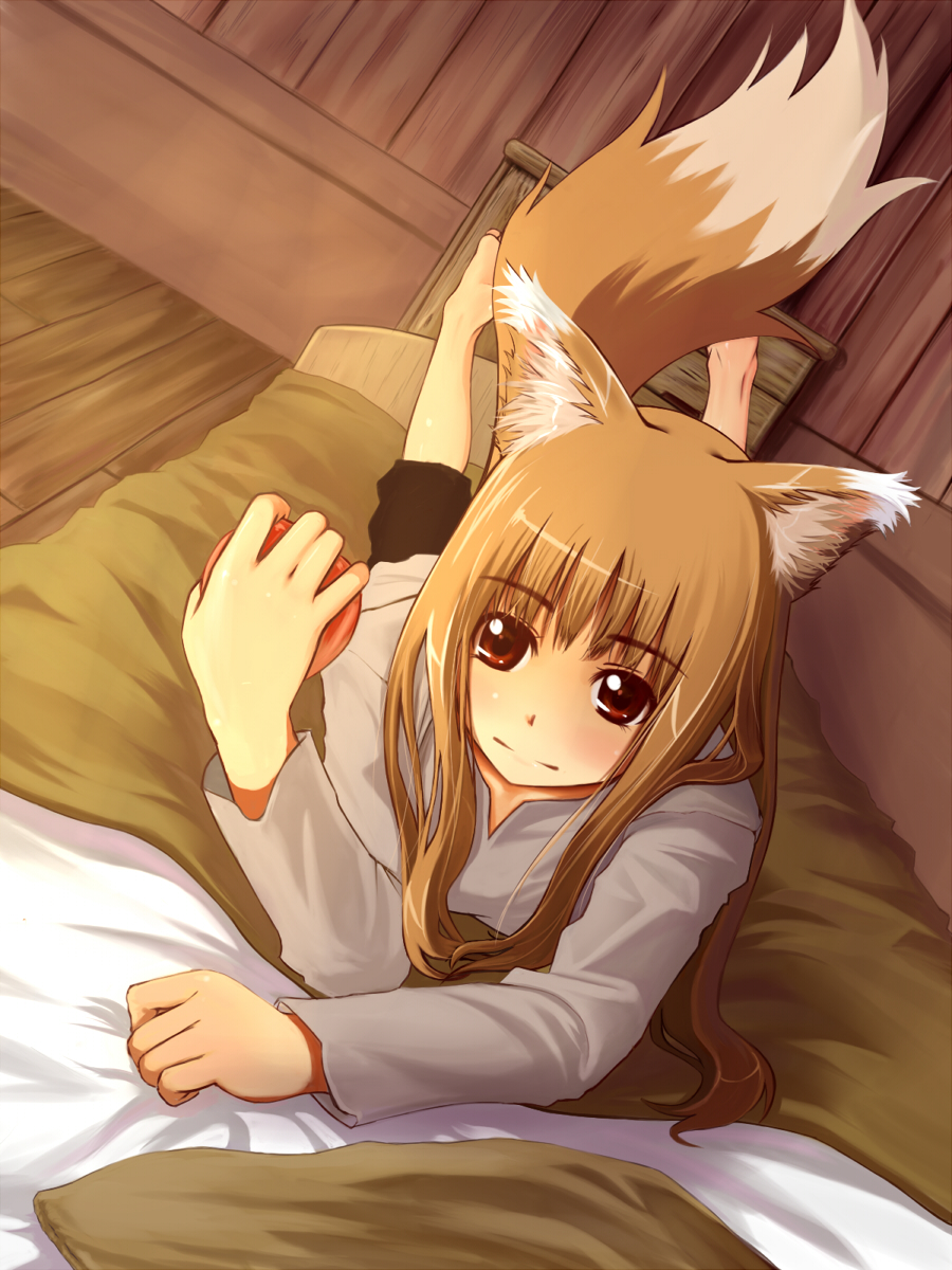 akie (tyamau0525), tyamau0525 (pixiv), holo, spice and wolf, bad id, bad pixiv id, highres, 00s, 1girl, animal ears, apple, barefoot, bed, blush, brown hair, feet, female focus, food, fruit, long hair, lying, on stomach, red eyes, smile, solo, tail, wolf ears, wolf tail