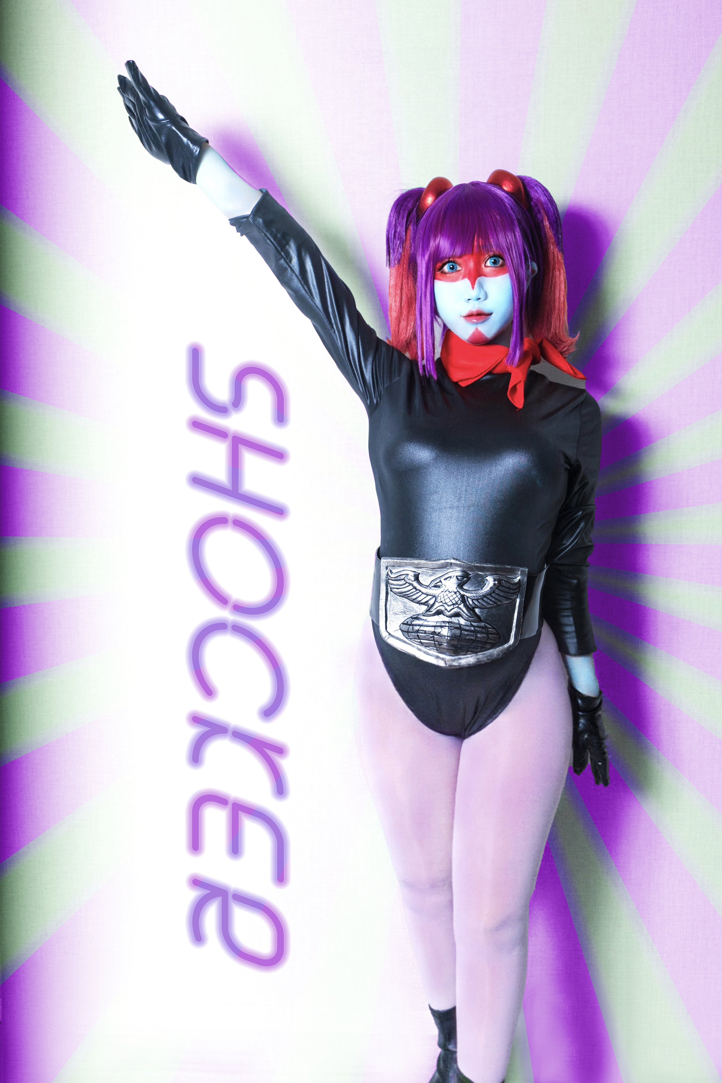 yukarisu, kamen rider, toujima tanzaburou wa kamen rider ni naritai, absurdres, highres, model request, photo (medium), 1girl, arm up, belt, black leotard, breasts, cosplay, english text, gradient hair, green eyes, hand in own hair, leotard, lips, long hair, looking at viewer, multicolored hair, open mouth, pantyhose, purple hair, shiny clothes, shocker (kamen rider), smile, solo, standing, twintails, two-tone background, yukarisu (cosplay)