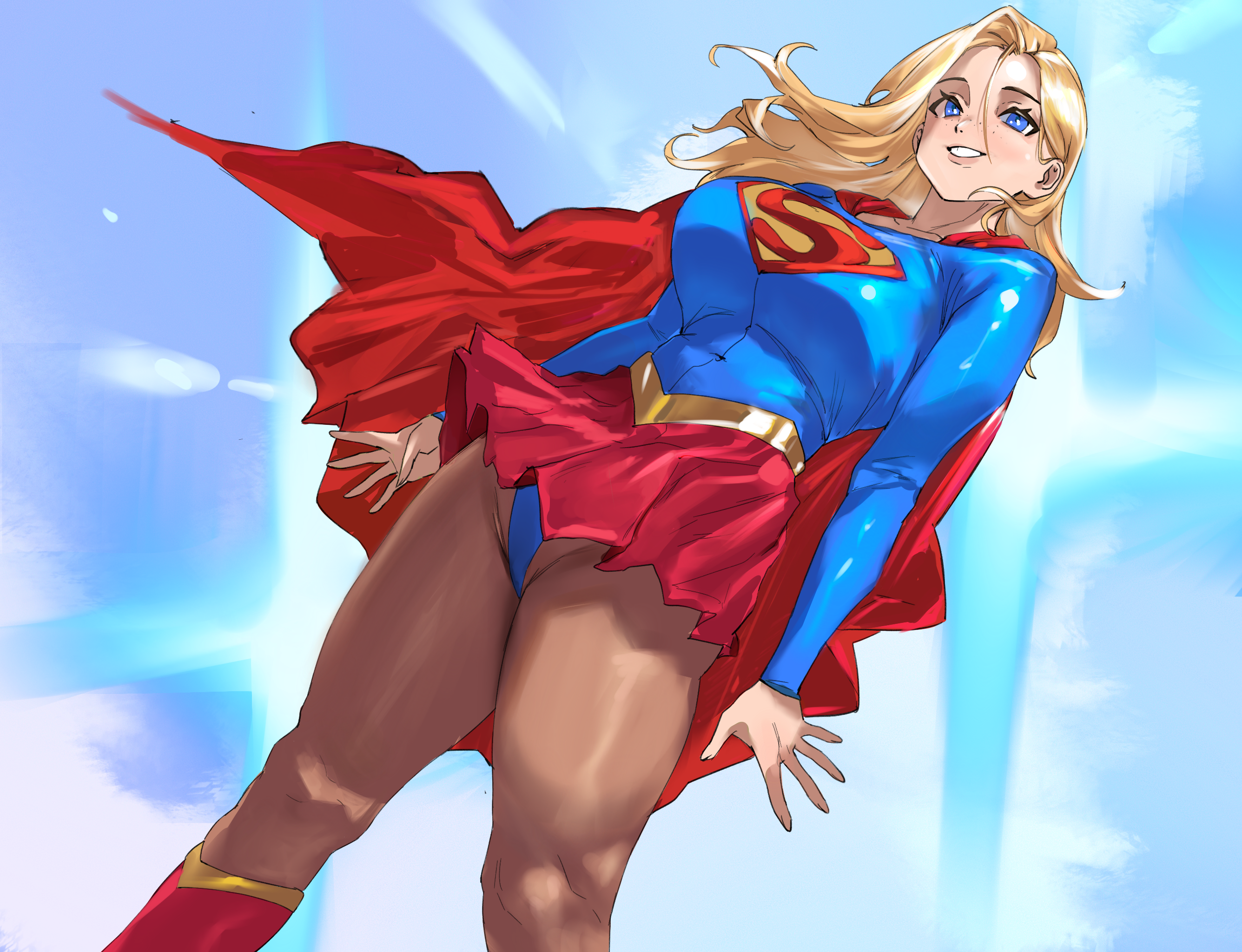 taiyang yu, supergirl, dc comics, superman (series), commentary, english commentary, highres, 1girl, blonde hair, blue bodysuit, blue eyes, blue leotard, bodysuit, boots, breasts, cape, grin, hair behind ear, large breasts, leotard, long hair, outdoors, pantyhose, pleated skirt, red boots, red cape, red skirt, skirt, sky, smile, solo, standing, superhero costume, superman logo