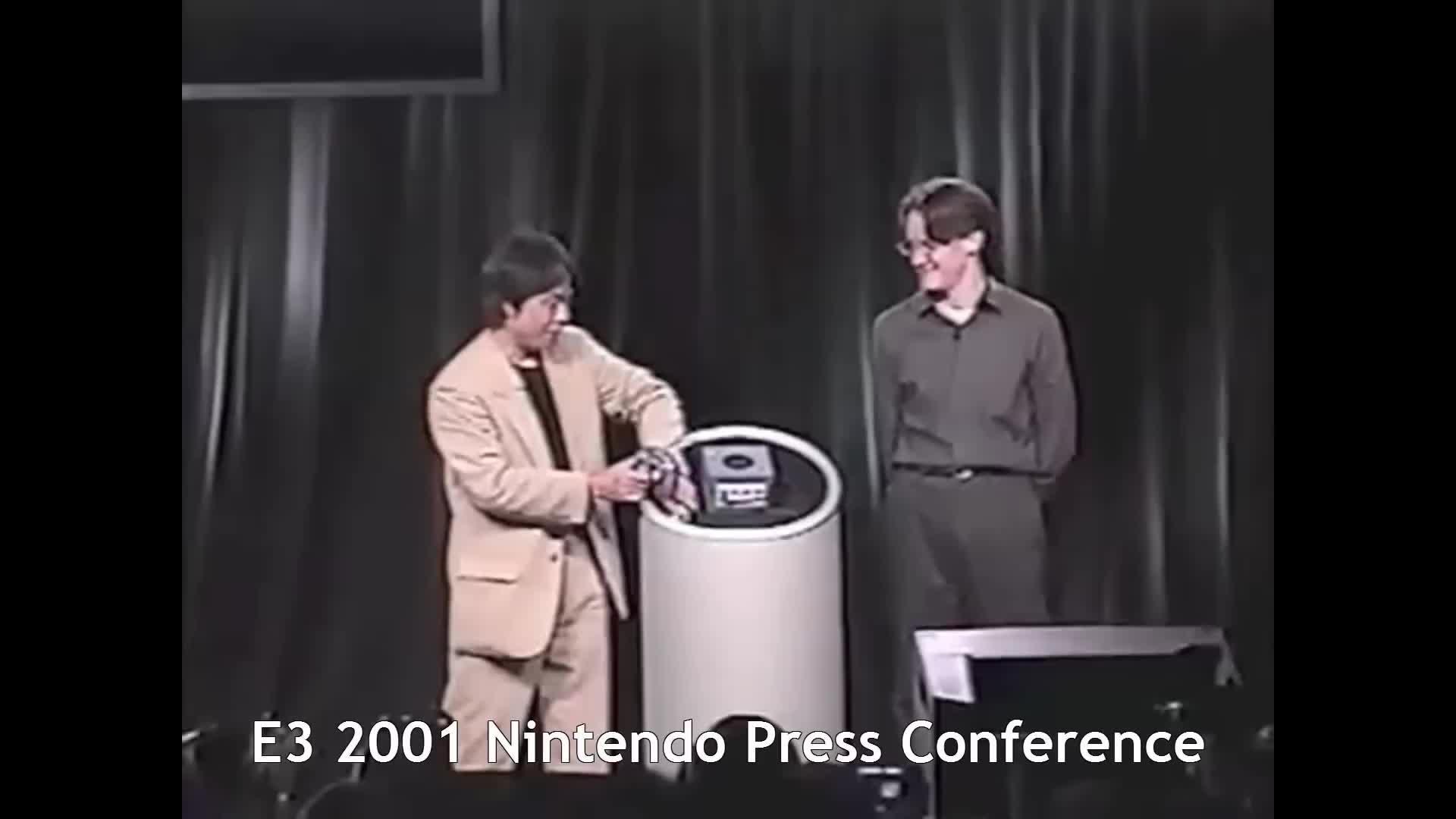 bowser, captain falcon, donkey kong, fox mccloud, ice climbers, kirby, link, mario, miyamoto shigeru, pikachu, princess peach, princess zelda, samus aran, sheik, yoshi, e3, super smash bros. melee, animated, sound, tagme, video, 2001, asian, bomb, cheering, exploison, explosive, fighting, gen 1 pokemon, glasses, japanese (nationality), multiple boys, suite