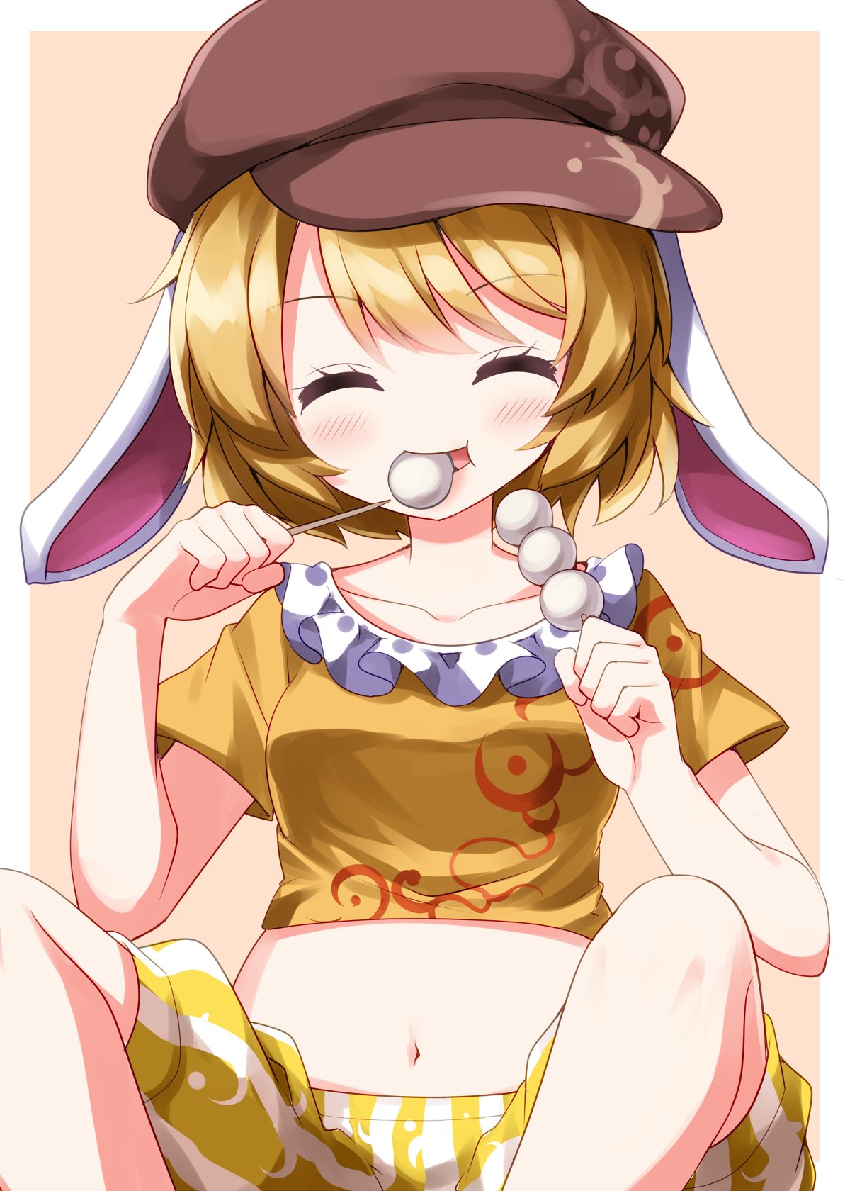 ruu (tksymkw), ringo (touhou), touhou, commentary request, highres, 1girl, animal ears, blonde hair, border, brown hat, closed eyes, collarbone, cropped shirt, dango, eating, facing viewer, feet out of frame, food, hands up, hat, holding, holding stick, knees, moon print, navel, newsboy cap, rabbit ears, shirt, short hair, shorts, solo, stick, stomach, striped clothes, striped shorts, wagashi, white border, yellow shirt, yellow shorts