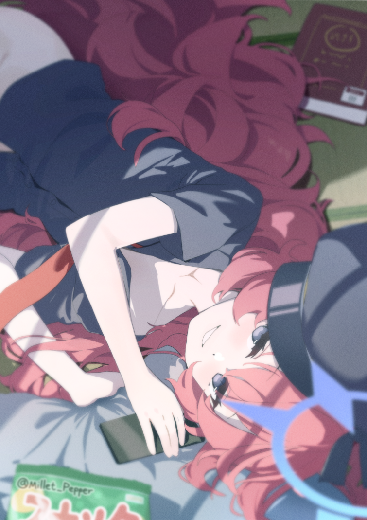 millet pepper, iroha (blue archive), blue archive, commentary, 1girl, black hat, black shirt, blue halo, book, cellphone, collarbone, grey eyes, halo, hat, long hair, looking at viewer, lying, on side, phone, red hair, shirt, short sleeves, smile, solo, twitter username