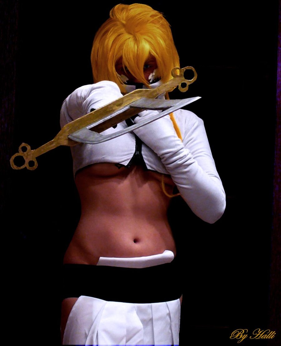 tier harribel, bleach, cosplay photo, photo (medium), 1girl, arrancar, blonde hair, breasts, cosplay, female focus, hollow (bleach), large breasts, midriff, number tattoo, side slit, solo, tattoo, tier harribel (cosplay), underboob, wig