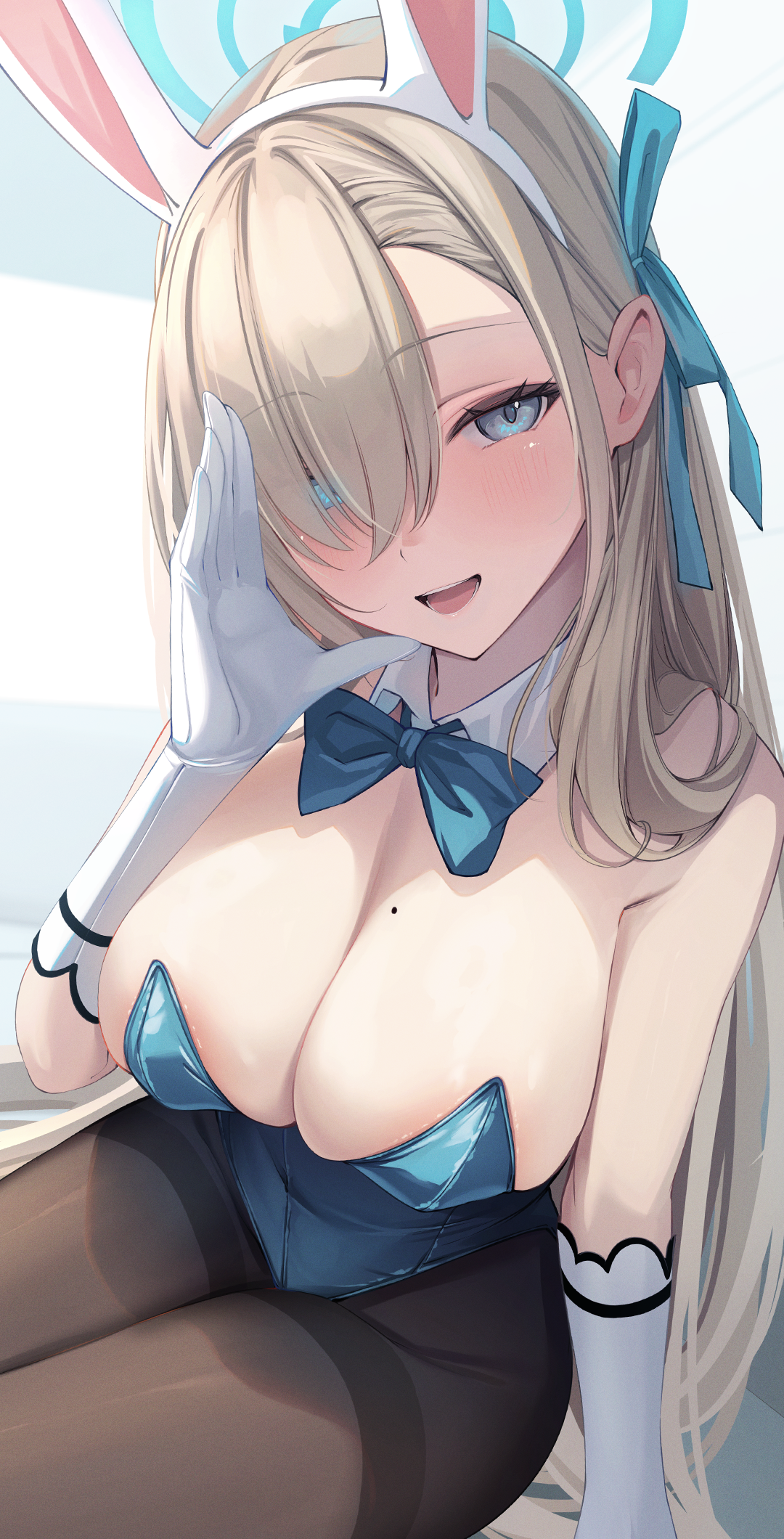 mutsumi nemuru, asuna (blue archive), asuna (bunny) (blue archive), blue archive, commentary request, highres, 1girl, animal ears, areola slip, bare shoulders, black pantyhose, blonde hair, blue bow, blue bowtie, blue eyes, blue halo, blue leotard, blue ribbon, blush, bow, bowtie, breasts, cleavage, detached collar, elbow gloves, fake animal ears, gloves, hair between eyes, hair over one eye, hair ribbon, halo, hand up, head tilt, large breasts, leotard, looking at viewer, mole, mole on breast, official alternate costume, open mouth, pantyhose, playboy bunny, rabbit ears, ribbon, sidelocks, simple background, sitting, smile, solo, strapless, strapless leotard, teeth, thighband pantyhose, thighs, tongue, undersized breast cup, whispering, white background, white gloves