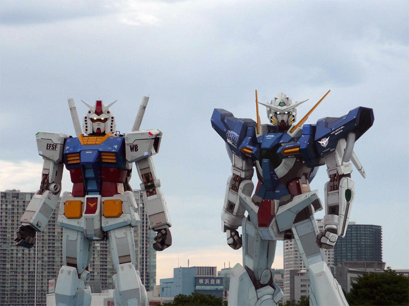 ra (pixiv120326), exia, gundam exia, rx-78-2 gundam, gundam, gundam 00, mobile suit gundam, md5 mismatch, photo (medium), 00s, cityscape, figure (medium), mecha, no humans, realistic, robot