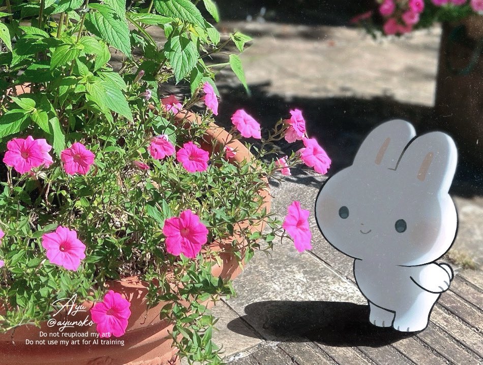 ayu (mog), original, commentary, english commentary, mixed media, animal, animal focus, closed mouth, day, flower, full body, no humans, outdoors, photo background, pink flower, rabbit, signature, smile, solid circle eyes, solo, standing, twitter username, watermark