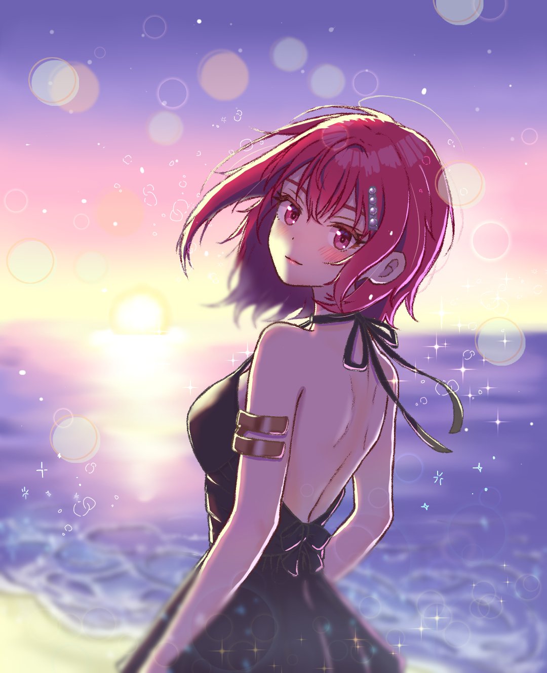 hiiragi gatsuo, gionji yukine, shine post, highres, 1girl, backless dress, backless outfit, beach, black dress, closed mouth, dress, hair ornament, looking at viewer, looking back, medium hair, ocean, outdoors, red eyes, red hair, solo, sparkle, sunset