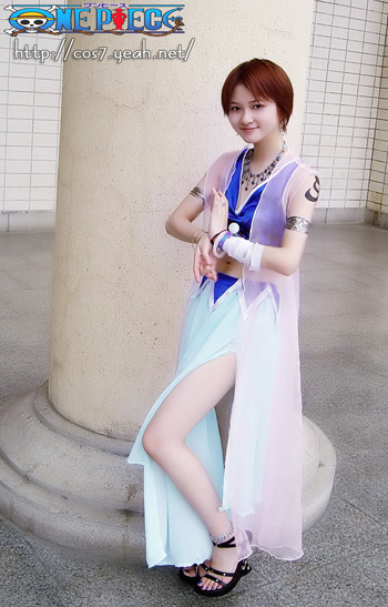 kiyoshi sakurazuka, nami (one piece), nami (one piece) (alabasta), one piece, real life, cosplay photo, photo (medium), 1boy, alabasta, arabian clothes, bangle, blue nails, bracelet, brown eyes, brown hair, cosplay, crossdressing, crossdressing (mtf), feet, full body, gold necklace, jewelry, log pose, nail polish, nami (one piece) (cosplay), necklace, sandals, shoulder tattoo, solo, tattoo, tile wall, tiles, trap