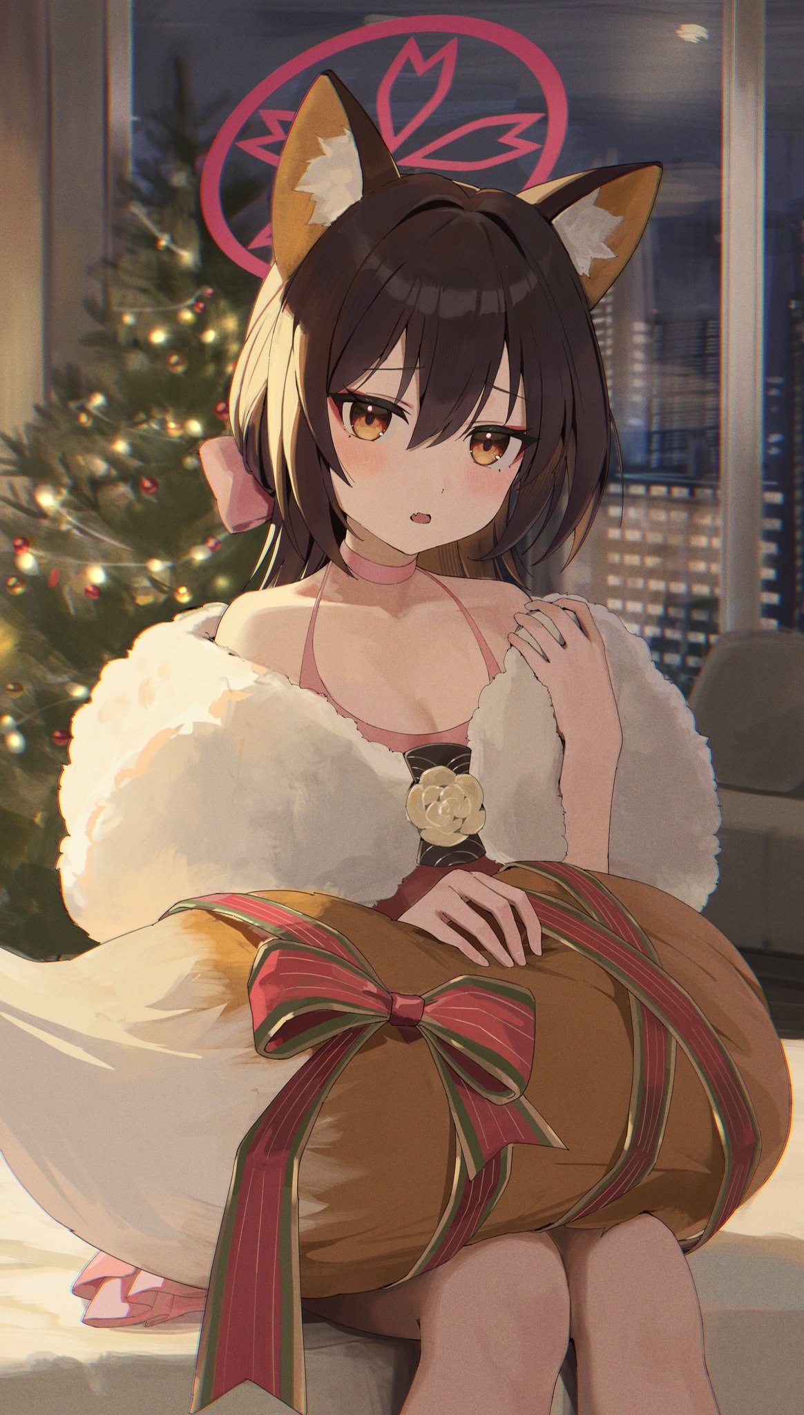 tem (tempainting1), izuna (blue archive), izuna (dress) (blue archive), blue archive, commentary request, highres, 1girl, animal ear fluff, animal ears, bow, brown eyes, brown hair, christmas lights, christmas tree, cityscape, dress, fangs, fox ears, fox tail, halo, hand up, holding own tail, indoors, knees, looking at viewer, night, on bed, parted lips, pink bow, pink dress, reflection, ribbon, sitting, solo, stole, tail, tail on lap, window