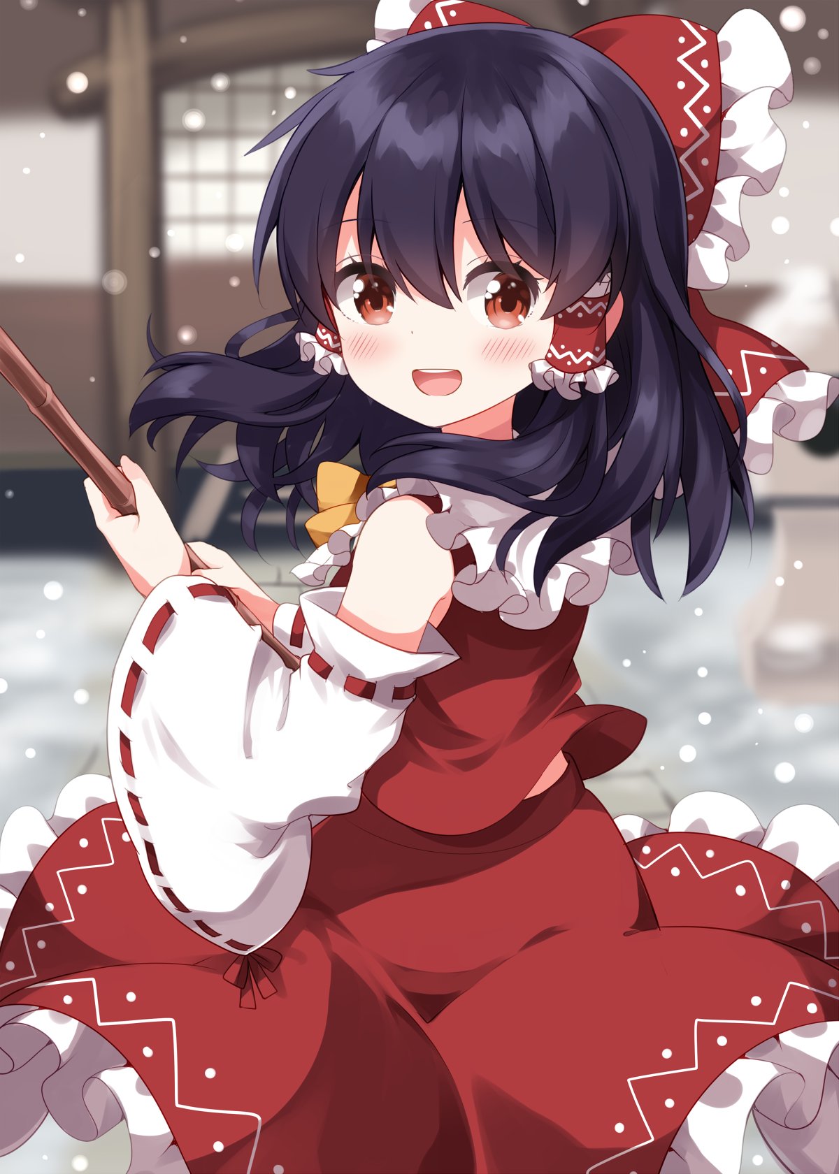 ruu (tksymkw), hakurei reimu, touhou, commentary request, highres, 1girl, ascot, bamboo broom, blurry, blush, bow, broom, brown eyes, brown hair, depth of field, detached sleeves, frilled bow, frilled hair tubes, frilled skirt, frills, hair bow, hair tubes, holding, holding broom, long hair, looking at viewer, open mouth, red bow, red skirt, ribbon-trimmed sleeves, ribbon trim, skirt, skirt set, smile, solo, teeth, upper teeth only, yellow ascot