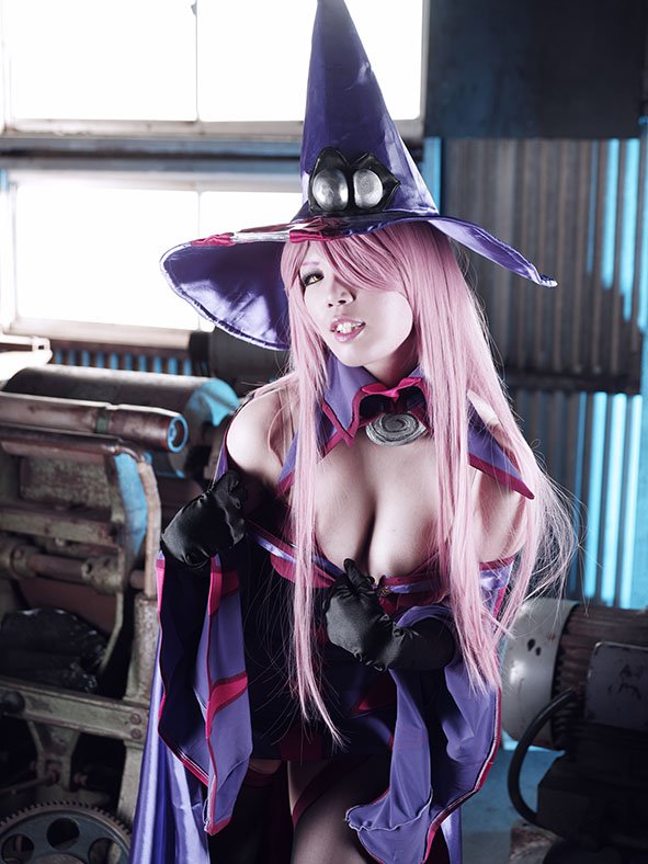 takana mikoko, konoe a. mercury, arc system works, blazblue, real life, commentary, cosplay photo, photo (medium), 1girl, 2018, black sclera, black shoes, bra, bra pull, breasts, cape, cleavage, clothes pull, colored sclera, contrapposto, cosplay, day, detached sleeves, dress, female focus, full body, gloves, grin, hair over one eye, hat, high heels, indoors, japanese (nationality), konoe a. mercury (cosplay), large breasts, long hair, long sleeves, looking at viewer, mature female, one eye covered, orange eyes, pink hair, pink lips, purple dress, purple gloves, purple hat, purple thighhighs, red cape, seductive smile, shoes, short dress, sleeveless, sleeveless dress, smile, solo, standing, strappy heels, sunlight, teasing, thighhighs, underwear, very long hair, wavy hair, wide sleeves, witch, witch hat