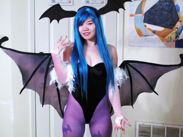morrigan aensland, morrigan aensland (cosplay), capcom, darkstalkers, real life, artist request, photo (medium), 1girl, animal print, asian, bat print, breasts, cosplay, head wings, purple hair, wings