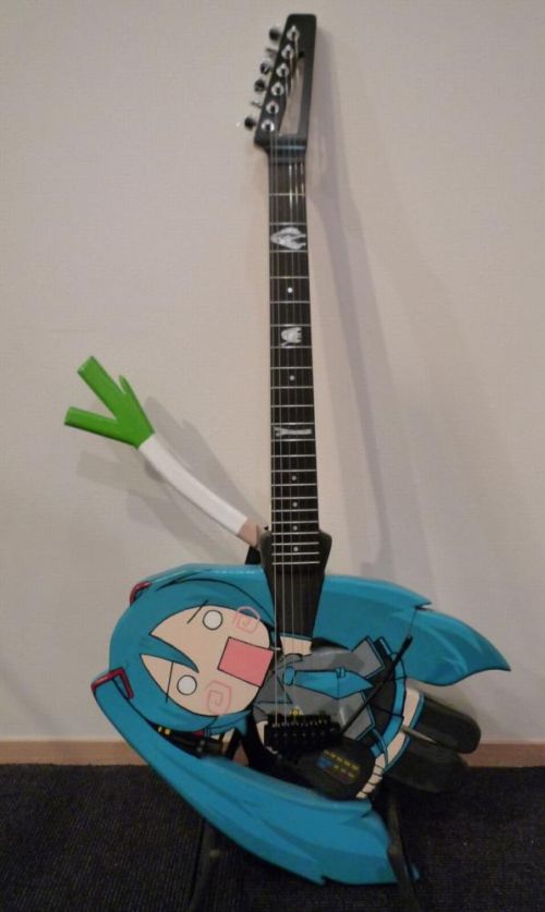 hachune miku, hatsune miku, nendoroid, vocaloid, photo (medium), blue hair, detached sleeves, guitar, instrument, spring onion, thighhighs