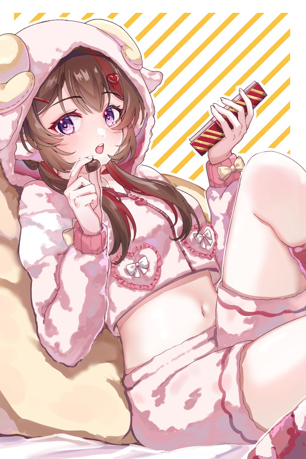 indie virtual youtuber, commentary request, commission, highres, second-party source, 1girl, animal hood, brown hair, chocolate, cropped hoodie, duckmo, fake horns, food, hair ornament, heart, heart hair ornament, holding, holding chocolate, holding food, hood, hood up, hoodie, horns, long hair, long sleeves, midriff, nagisa (vtuber), navel, open mouth, pink hood, pink hoodie, pink shorts, purple eyes, sheep hood, sheep horns, shorts, sitting, sleepwear, solo, virtual youtuber